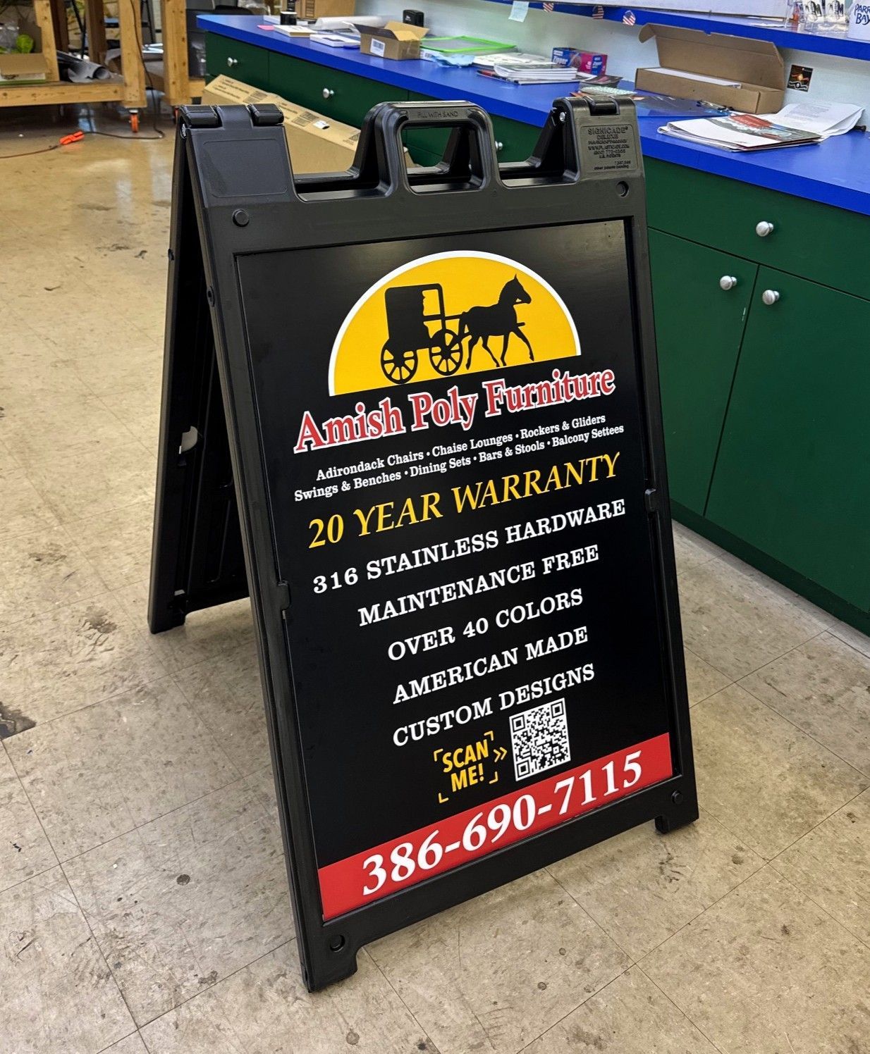 Black A-frame sign promoting 
