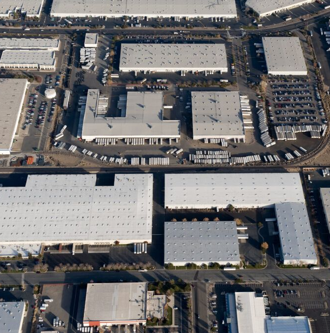 An aerial view of a large industrial area with lots of buildings
