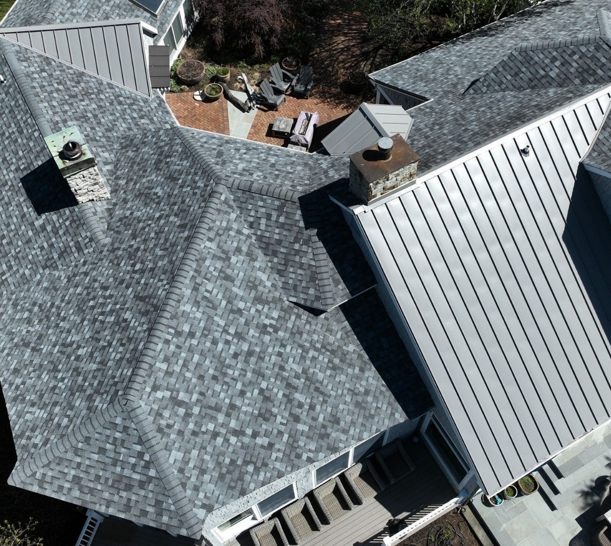 An aerial view of a house with a slate roof.