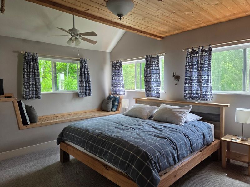 There is a large bed in the middle of the room.