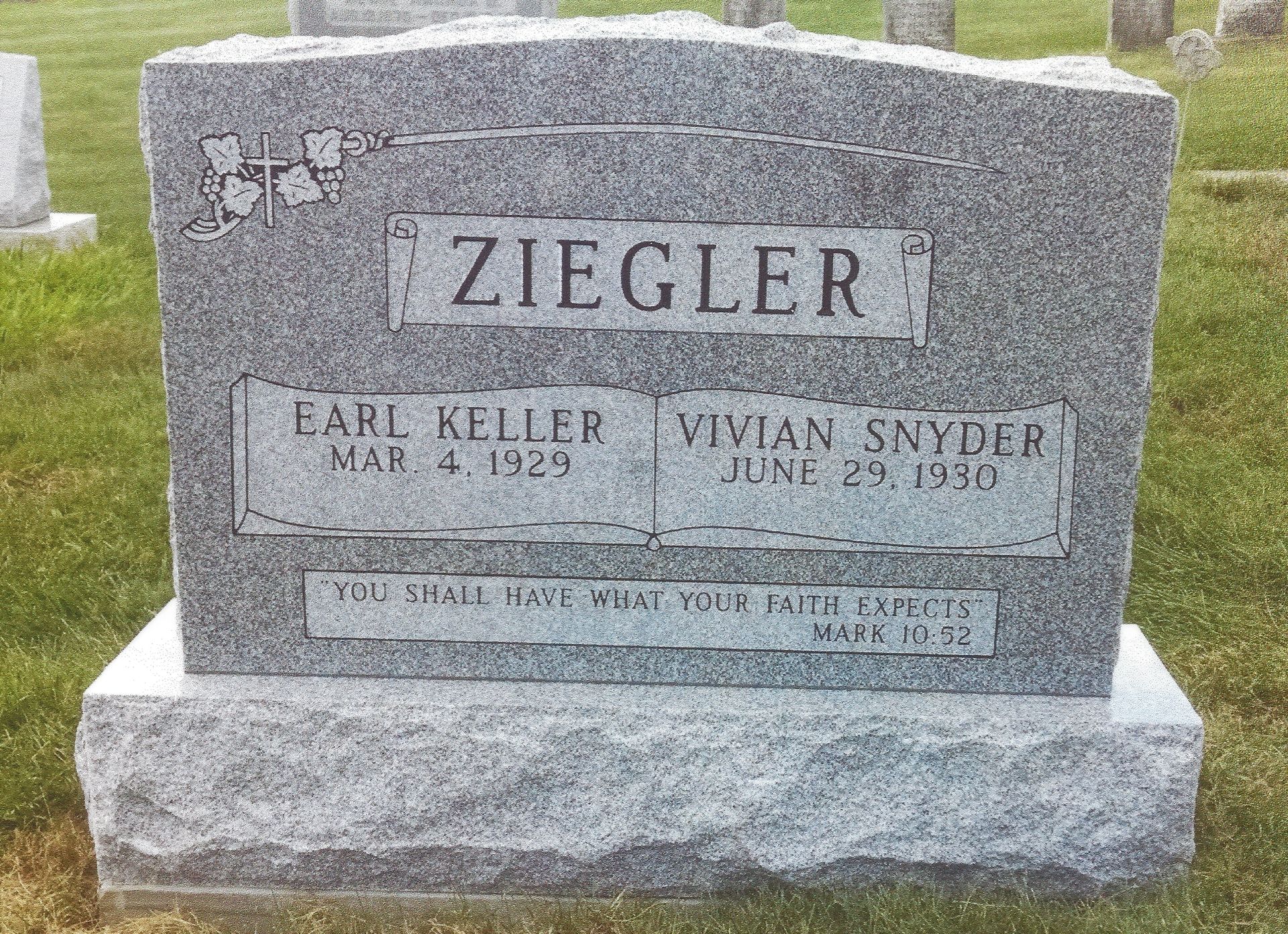 Ziegler gravestone with two name plaques in a cemetery, gray stone with engraved cross