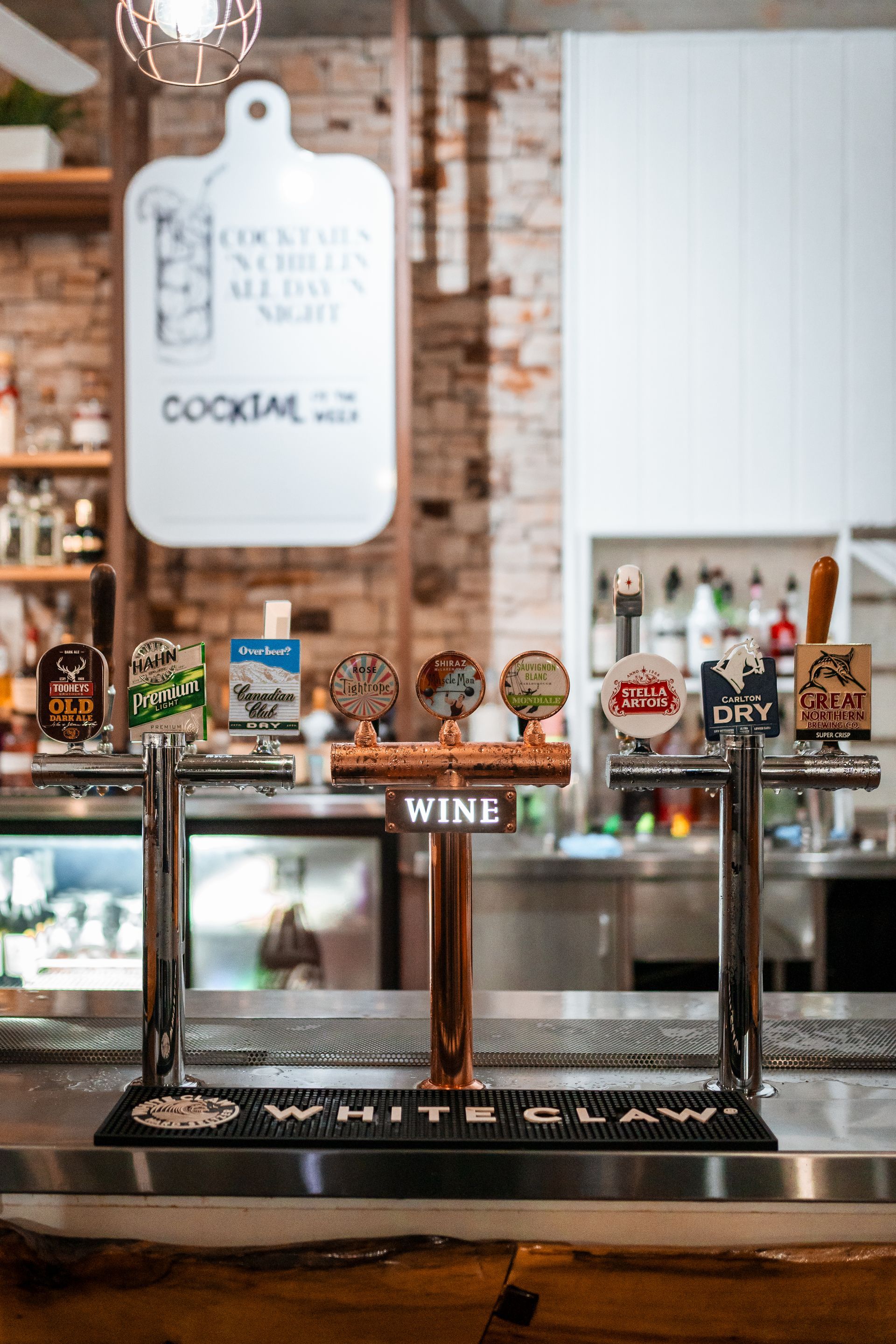 A Bar with A Wine Tap in The Middle of It — Chop 'n Chill in Port Macquarie, NSW
