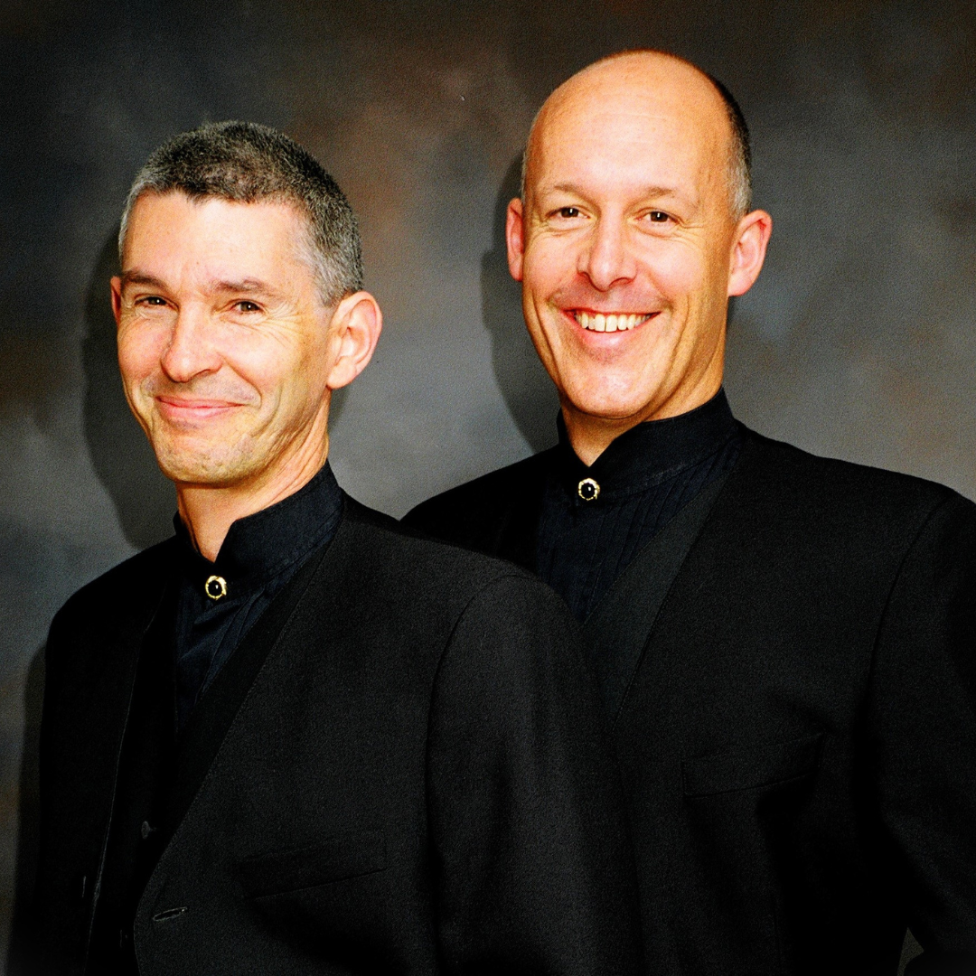 Two Men in Black Suits Are Smiling for The Camera — Chop 'n Chill in Port Macquarie, NSW
