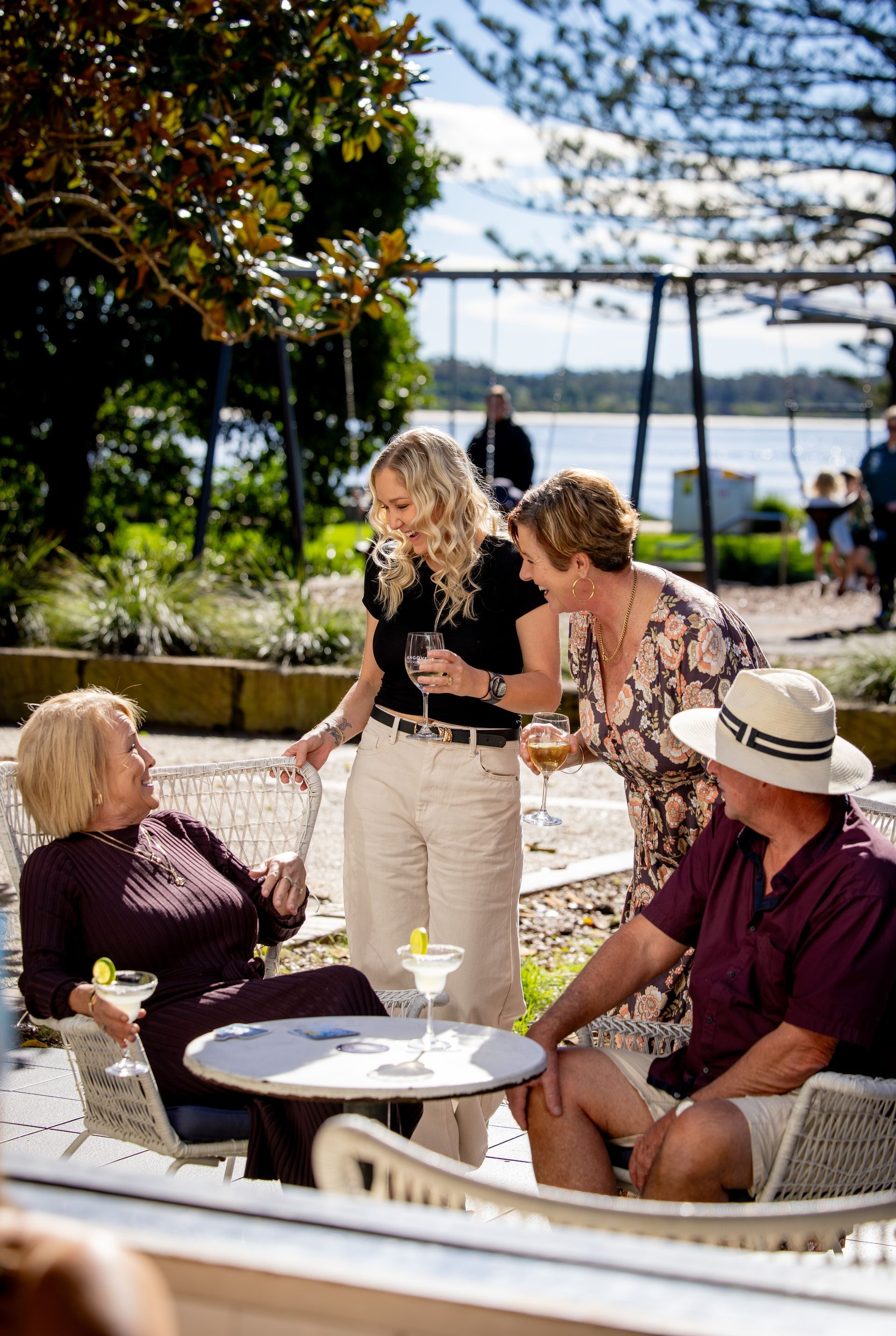 A Table With Two Drinks And Two Paintings On The Wall — Chop 'n Chill in Port Macquarie, NSW