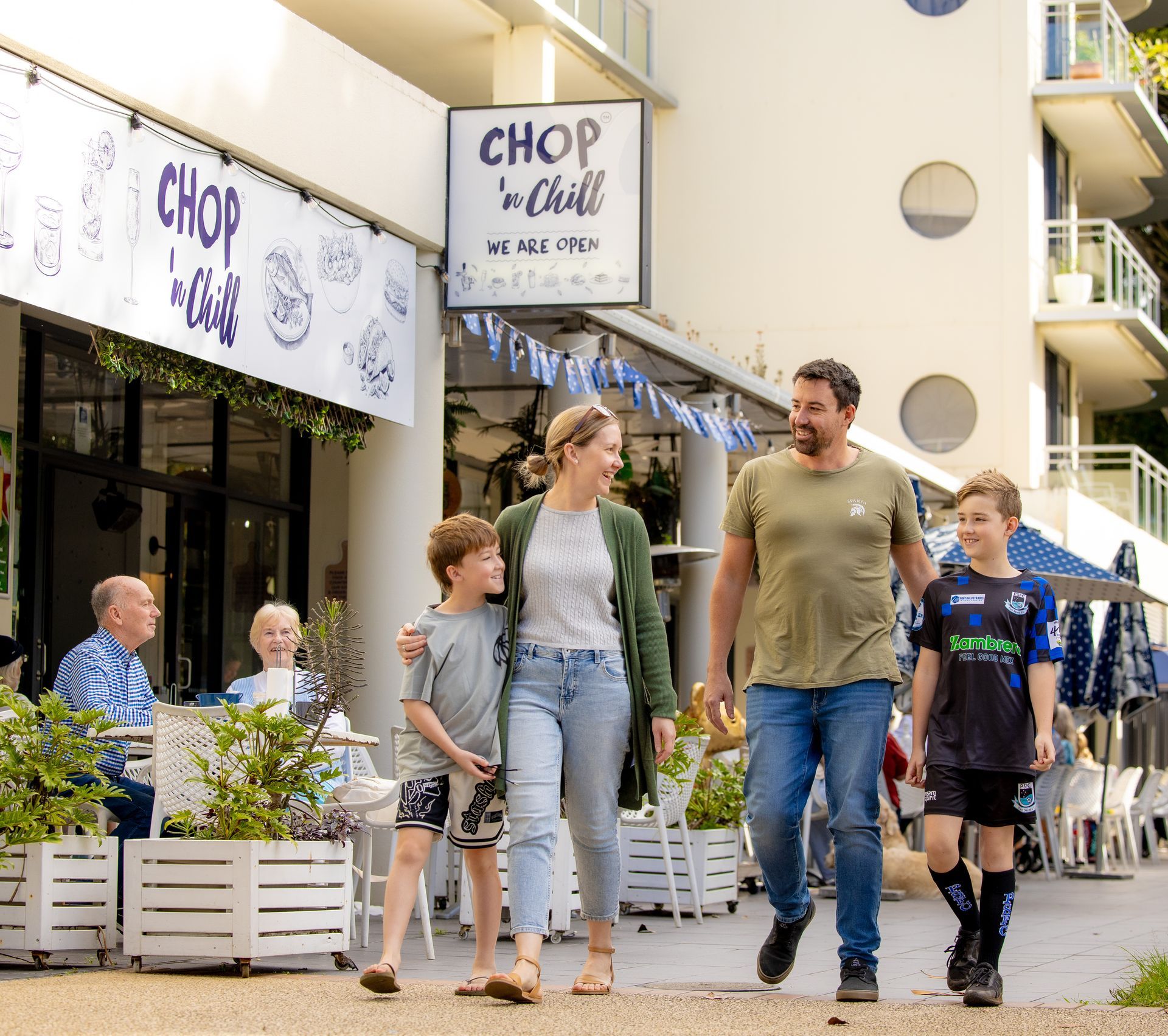 Inside of Chop 'n Chill Restaurant People Enjoying And Having Food — Chop 'n Chill in Port Macquarie, NSW