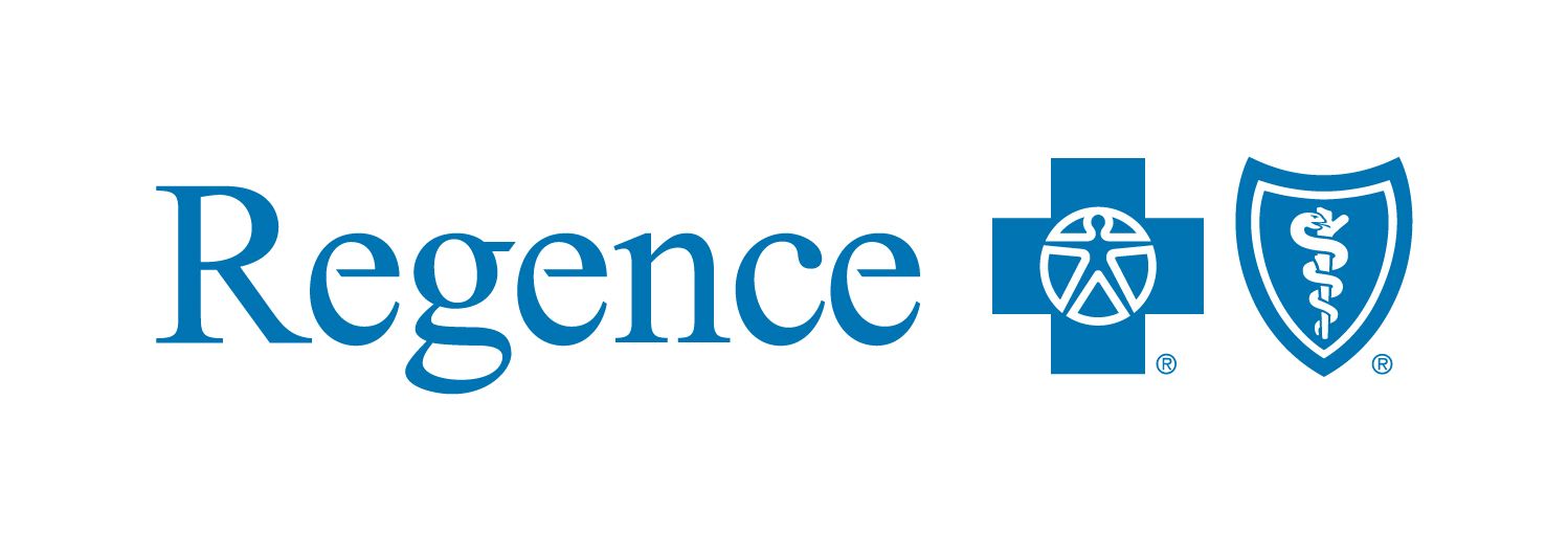 A blue cross of idaho logo with a mountain in the background