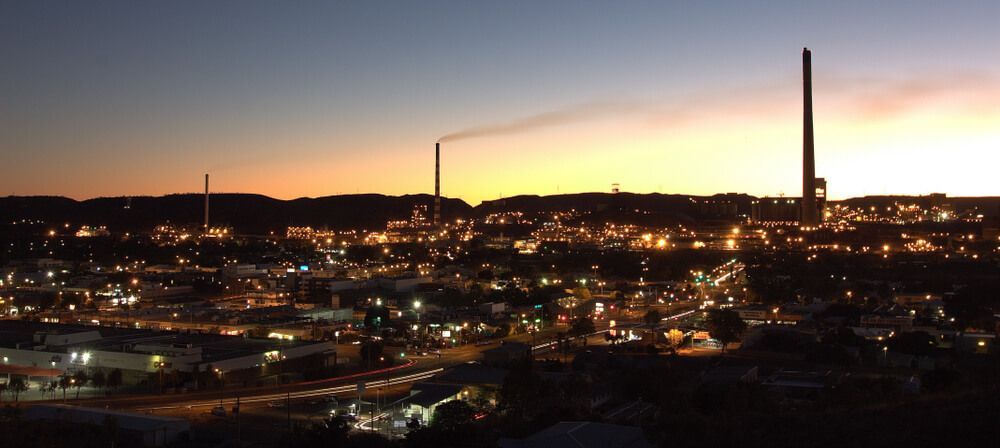 A City at Night With a Sunset in the Background — Bootle Timber QLD Pty Ltd in Mt Isa, QLD