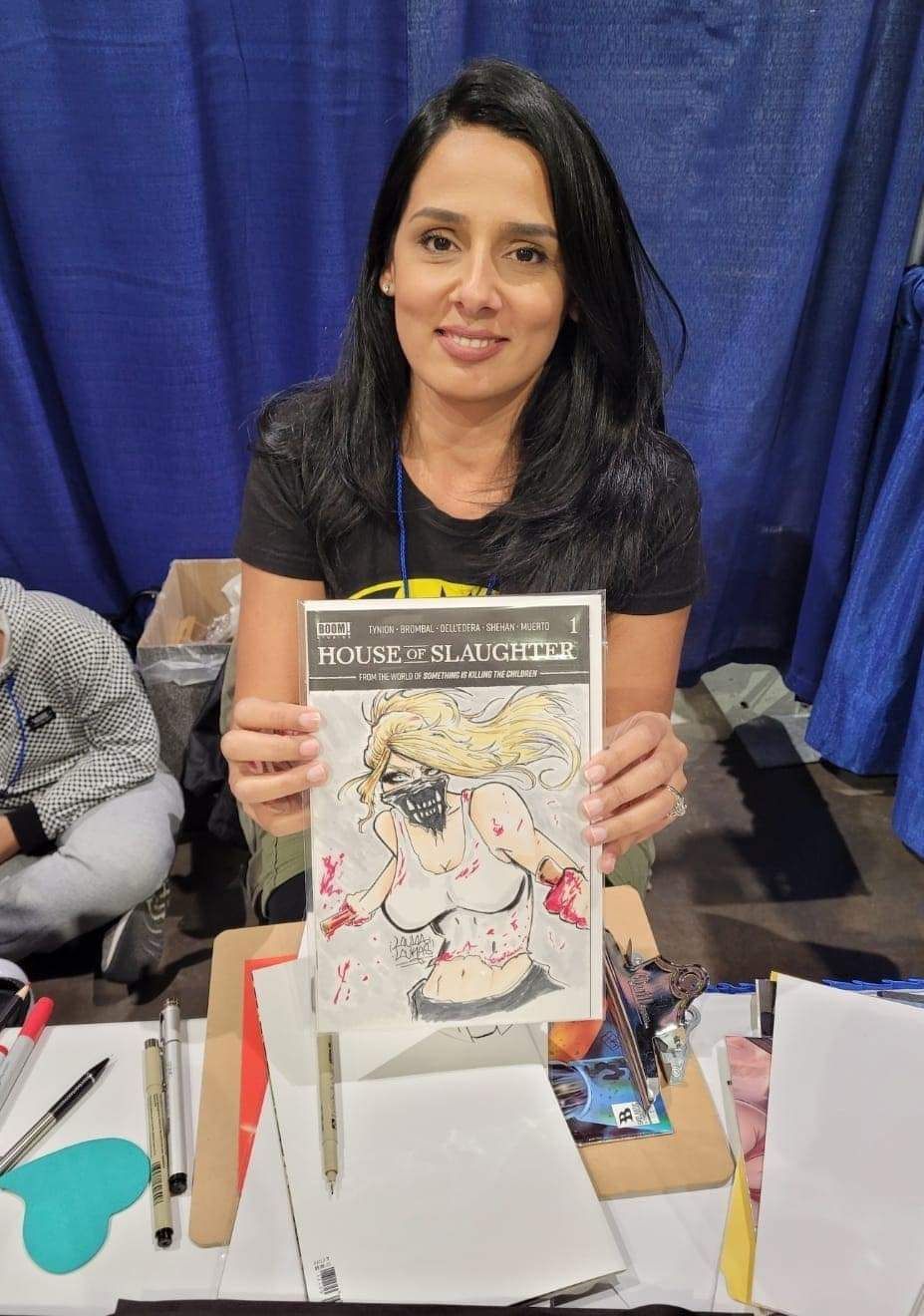 A person holds a comic book titled 