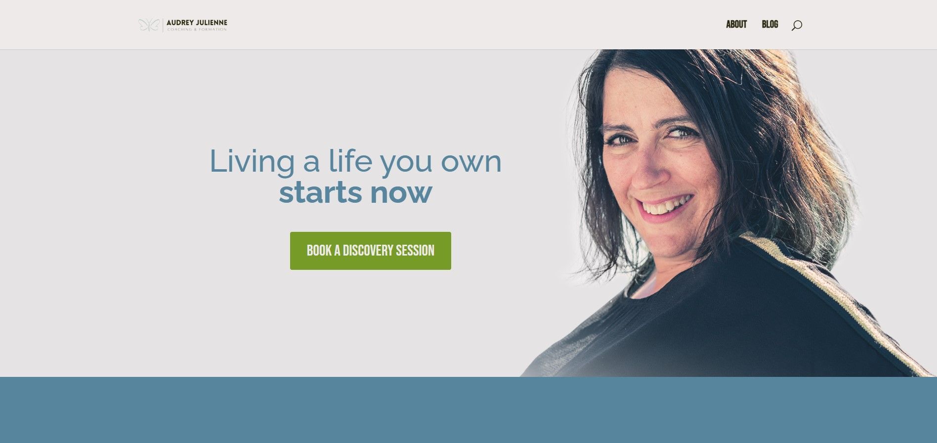 Woman smiling beside the text
