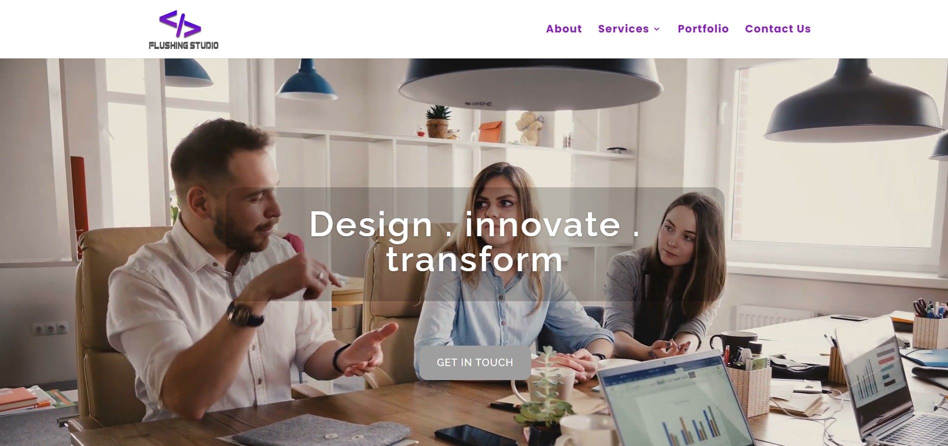 A team collaborates at an office table with the text
