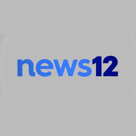 The News 12 logo featuring the word "news" in light blue and the number "12" in dark blue on a gray background.