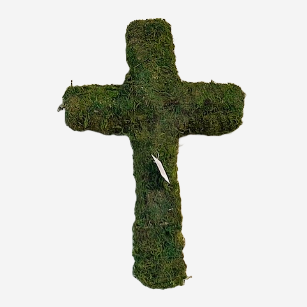 Green moss-covered cross against a white background.
