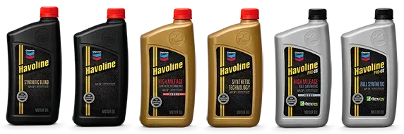 Six different bottles of Havoline motor oil.