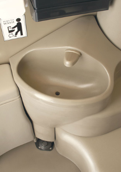 A bathroom sink with a sign that says walk in wash