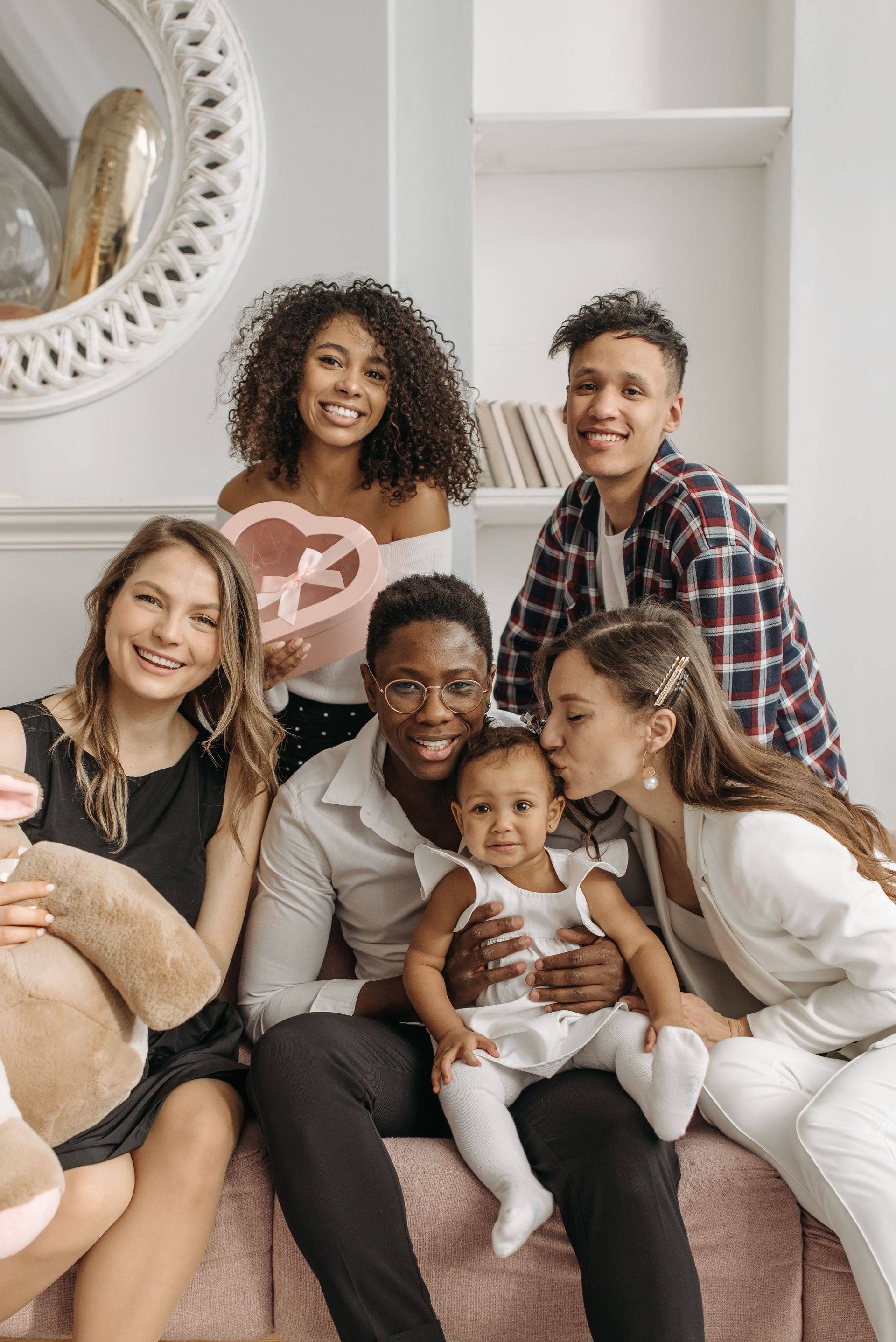 Happy blended family smiling together representing estate planning for blended families in San Diego California