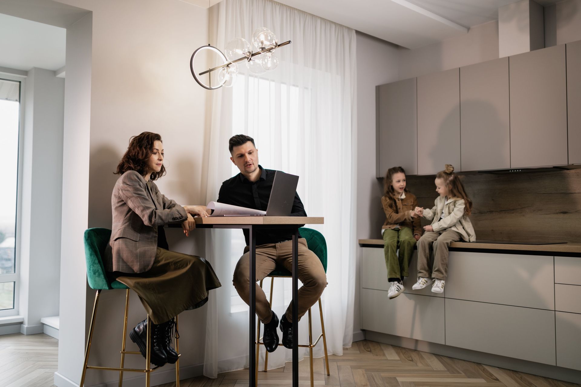 California parents with young children reviewing estate planning documents to name a guardian.