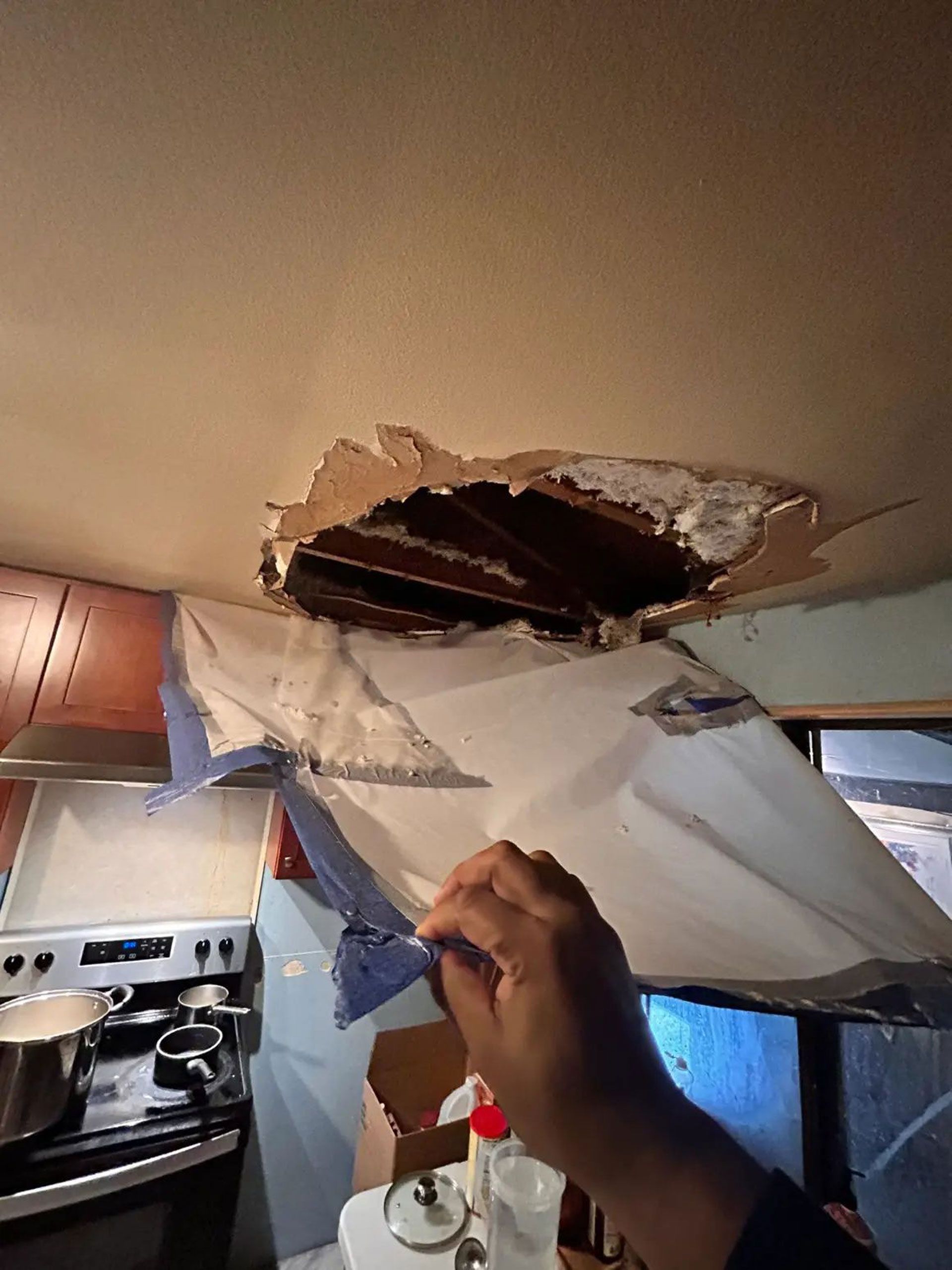 Hole in the ceiling in a kitchen