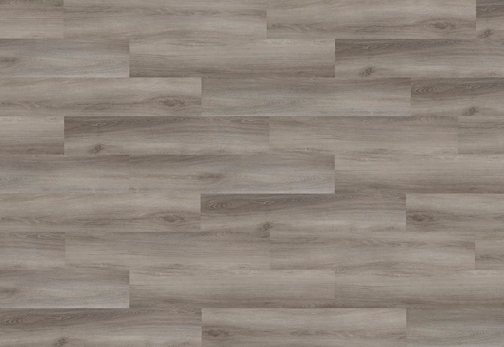 A close up of a gray wooden floor with a white background.
