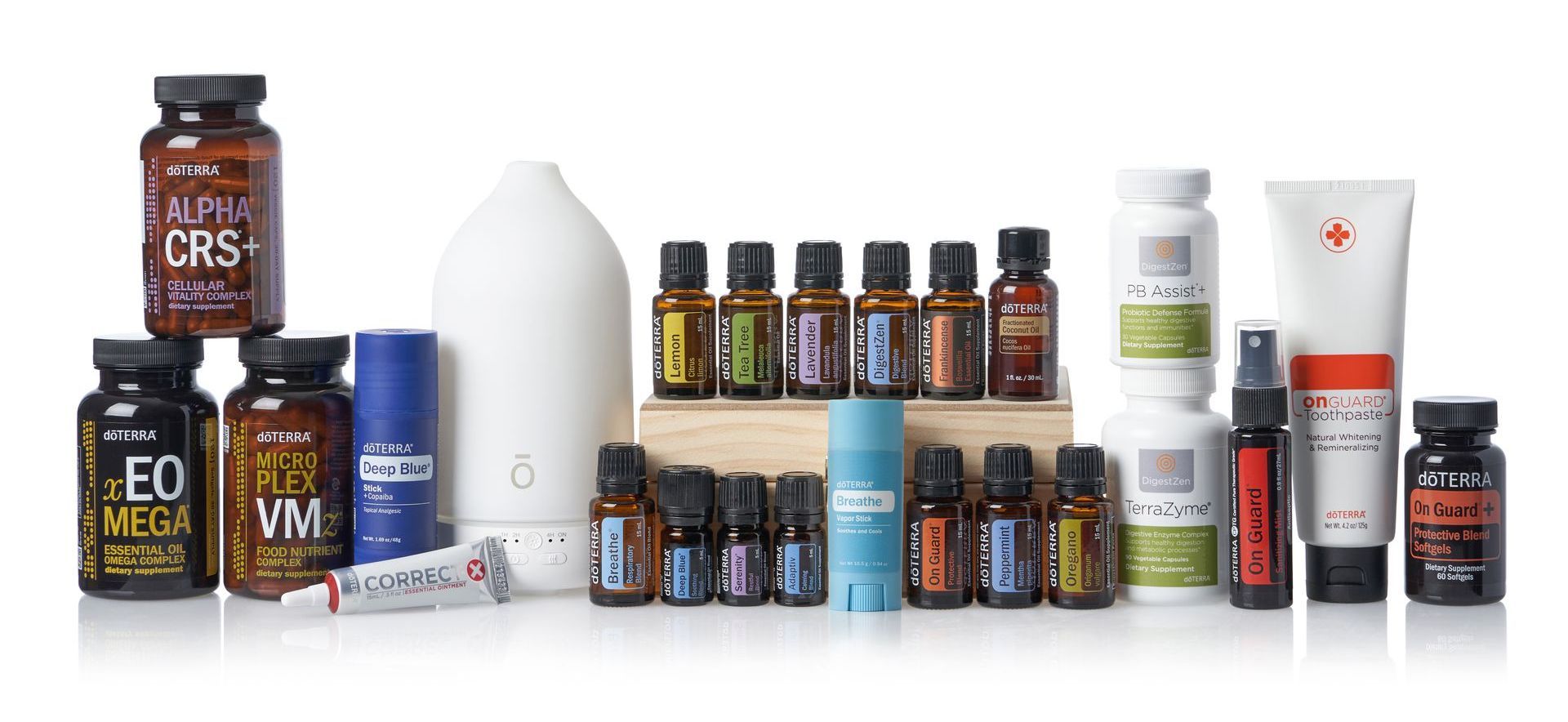 Assortment of health and wellness products: essential oils, supplements, and skincare items.