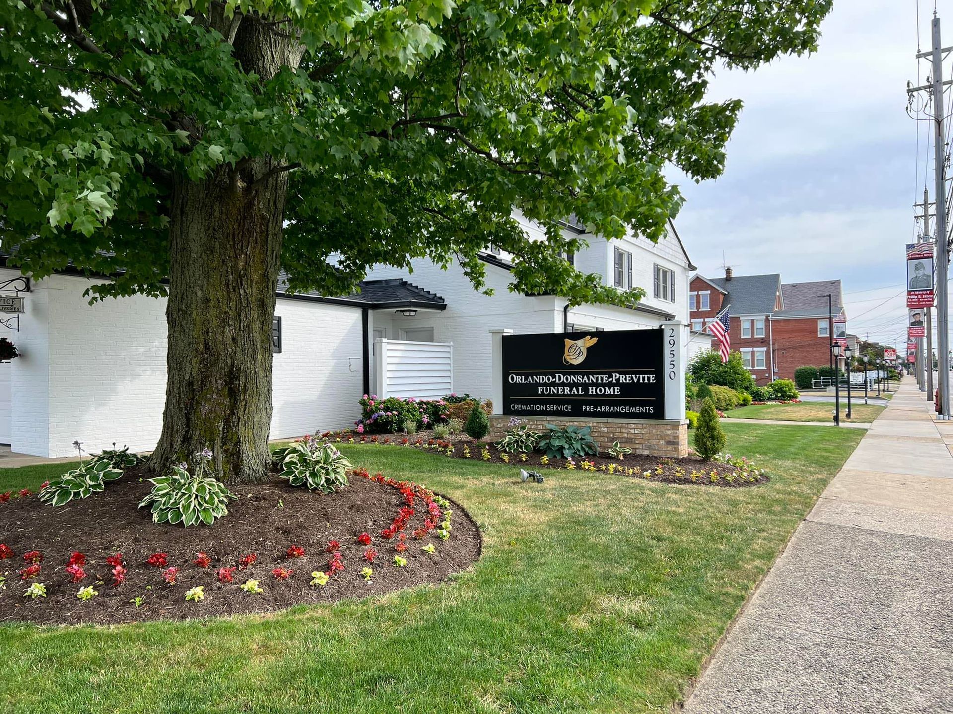 Funeral home building with updated signage welcoming families with comfort and care.