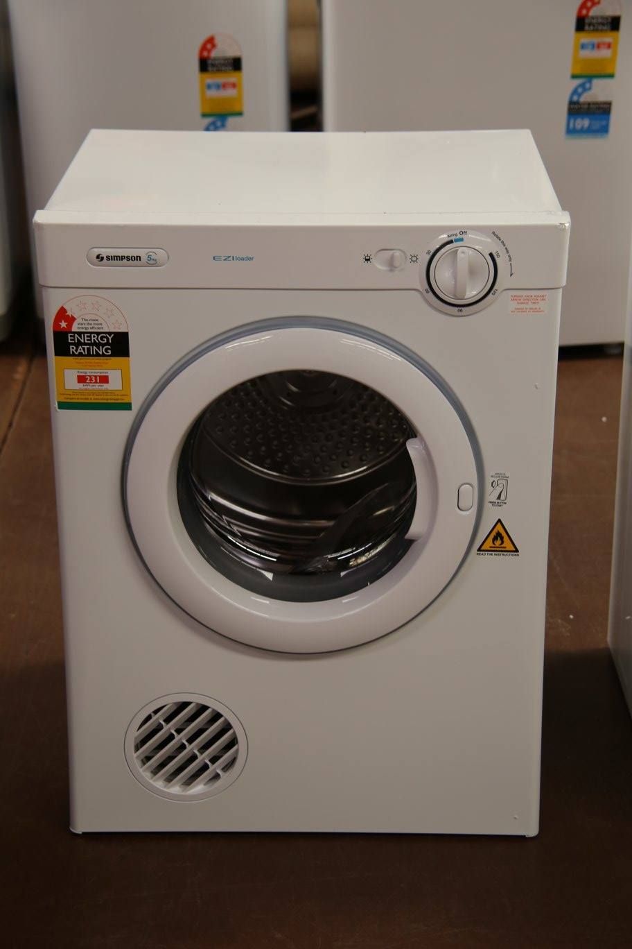 White Clothes Dryer With a Round Door and a Control Knob — Enterprise Electrics NT Pty Ltd in Tennant Creek, NT