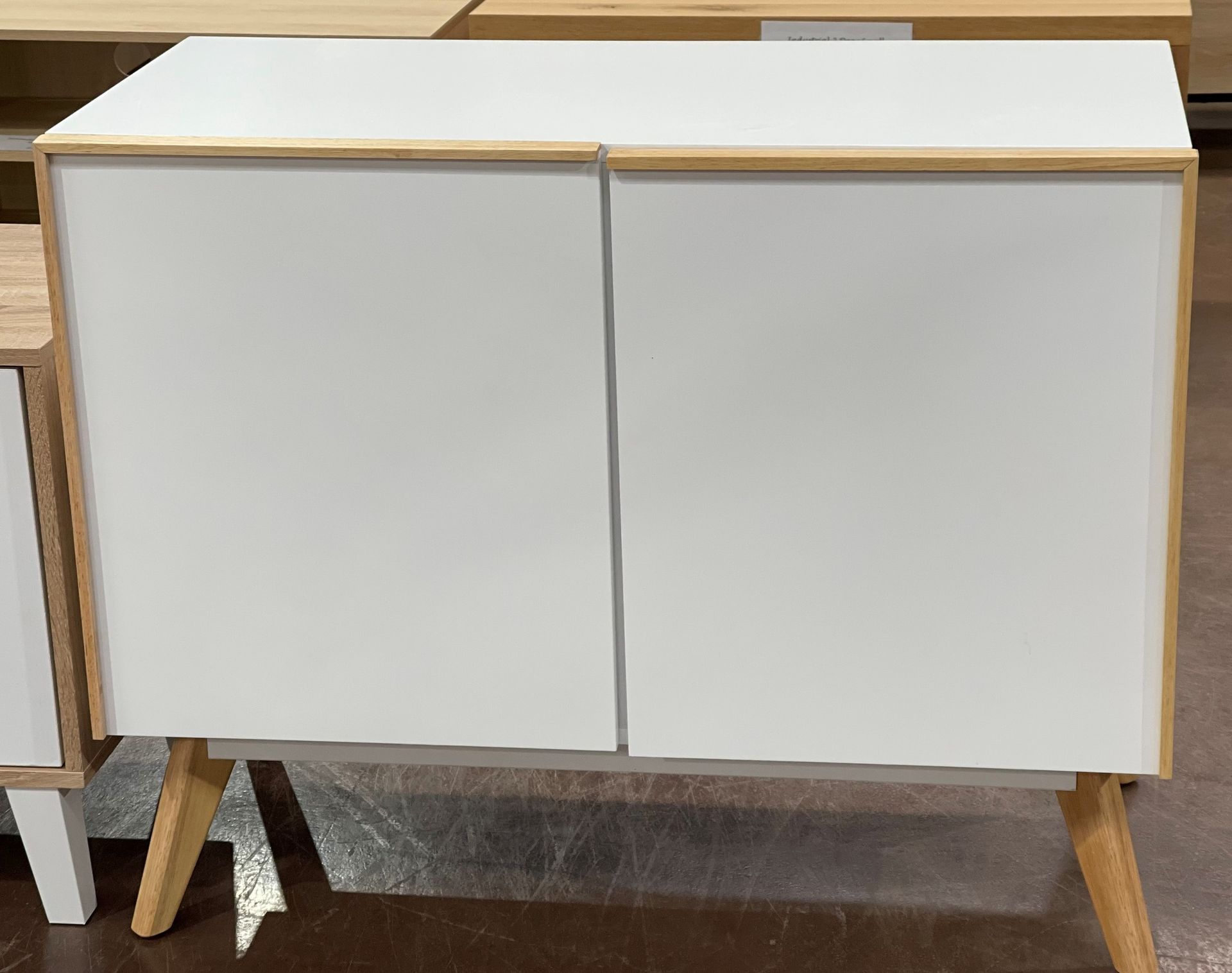 White Cabinet With Two Doors and Wooden Trim — Enterprise Electrics NT Pty Ltd in Tennant Creek, NT