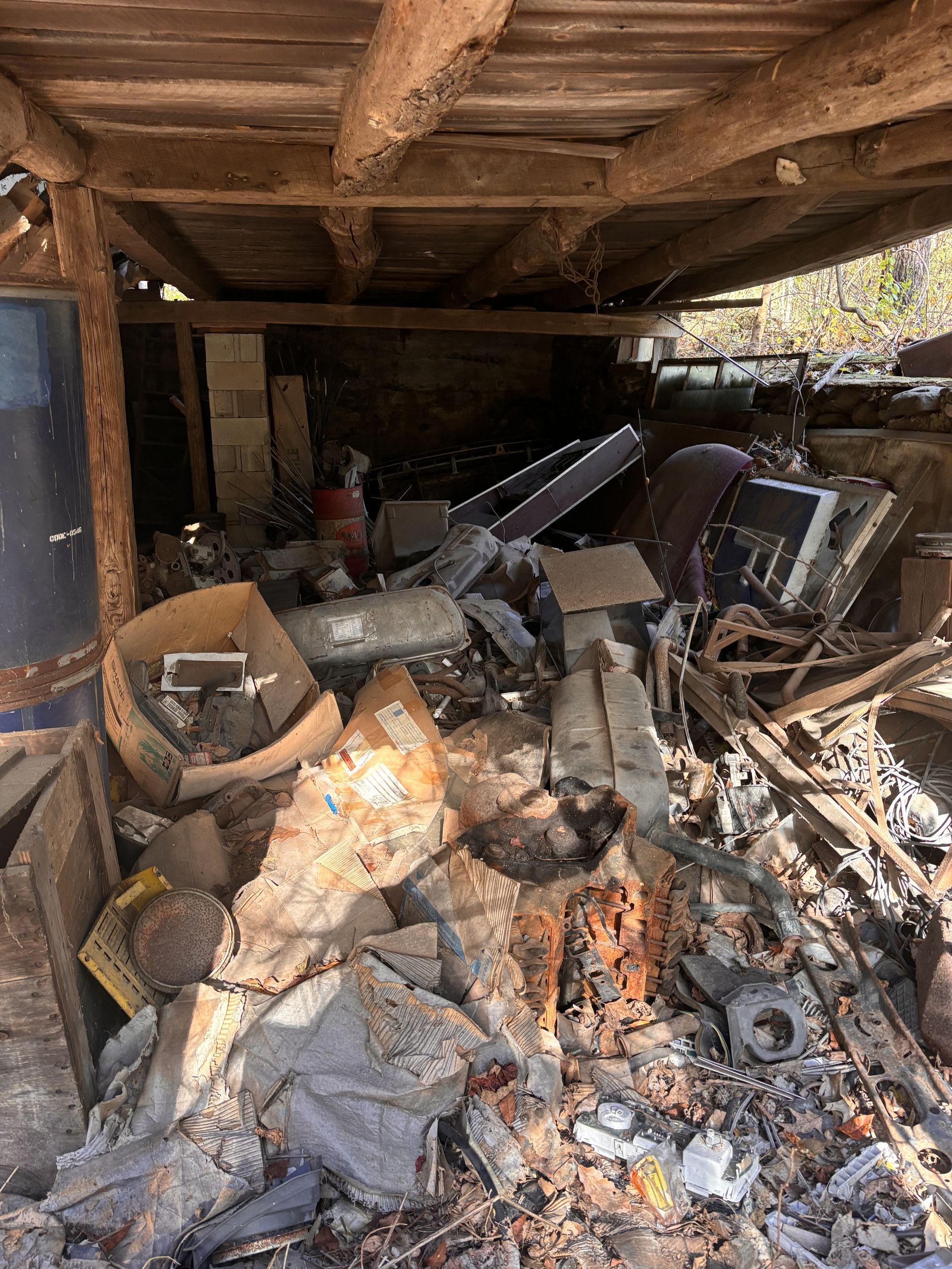 There is a lot of trash in the shed.