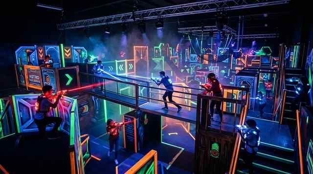 a vibrant game room illuminated by neon lights featuring a glowing decor