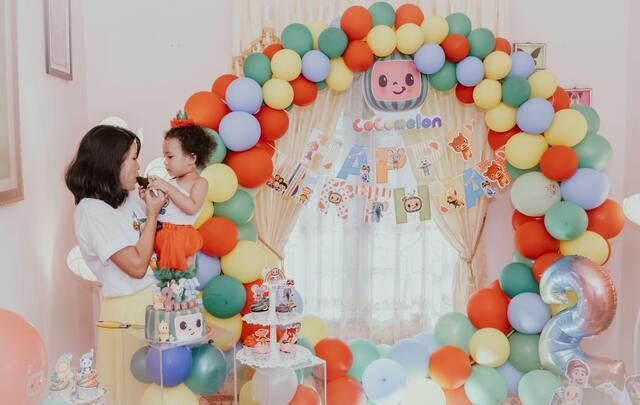 cocomelon theme birthday party with mom and kid