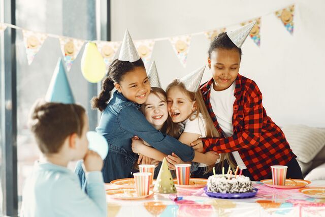 five kids celebrating birthday