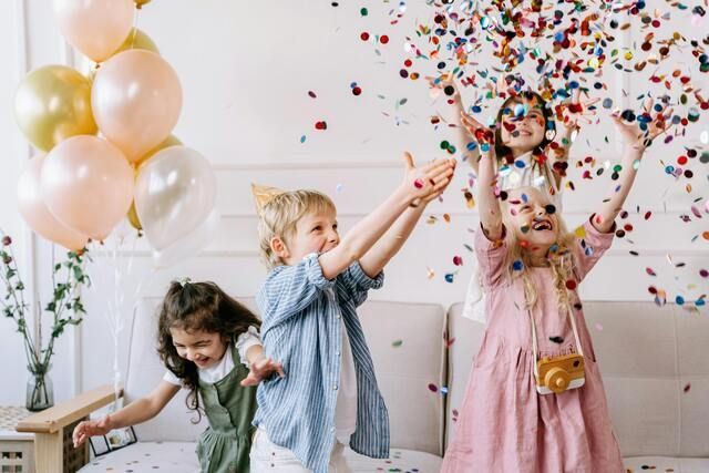 kids-throwing-confettis-birthday-party