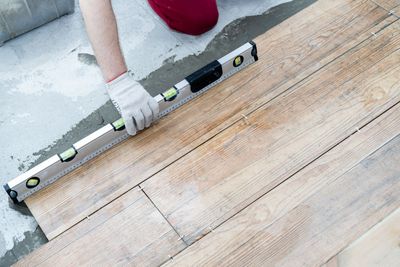 Installer from our company putting in new flooring