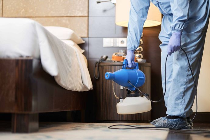 a man maintaining floors for a homeowner