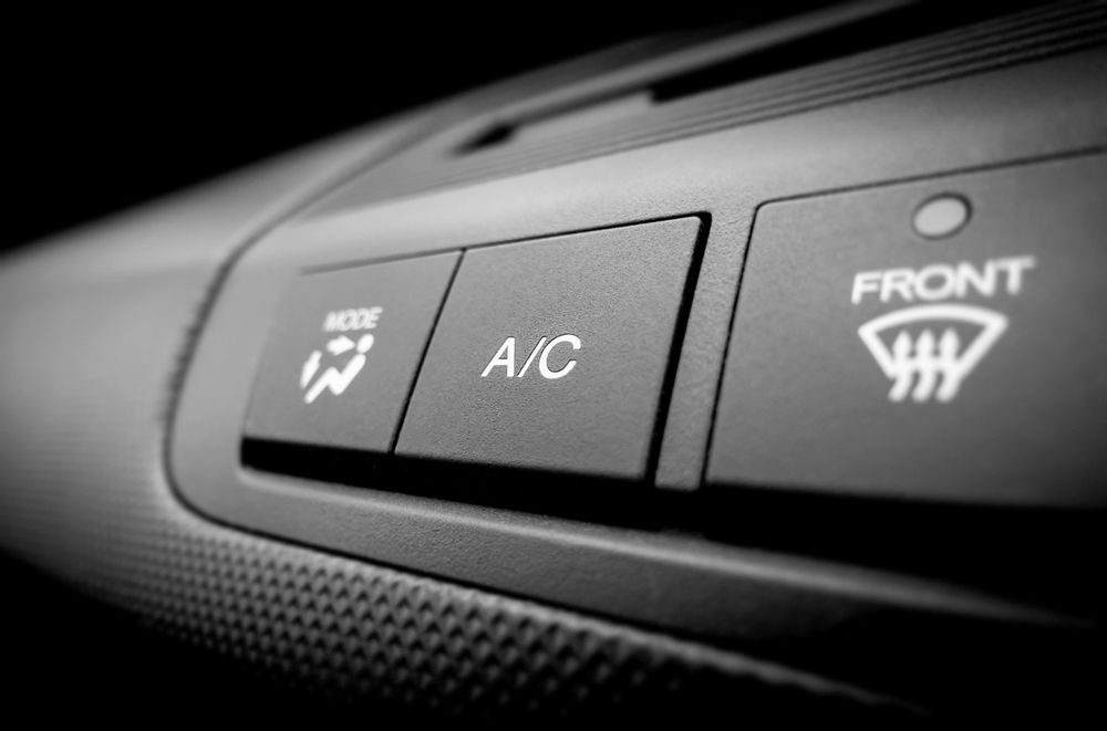 A Close Up Of A Car A/c Button And Front Windshield Wiper Button — Advanced Auto Tech In Port Macquarie, NSW