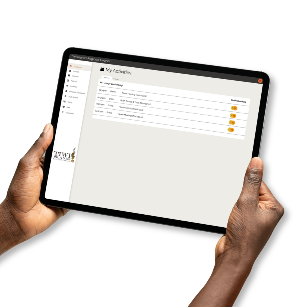 Hands holding a tablet displaying a web dashboard with a list and orange toggle icons