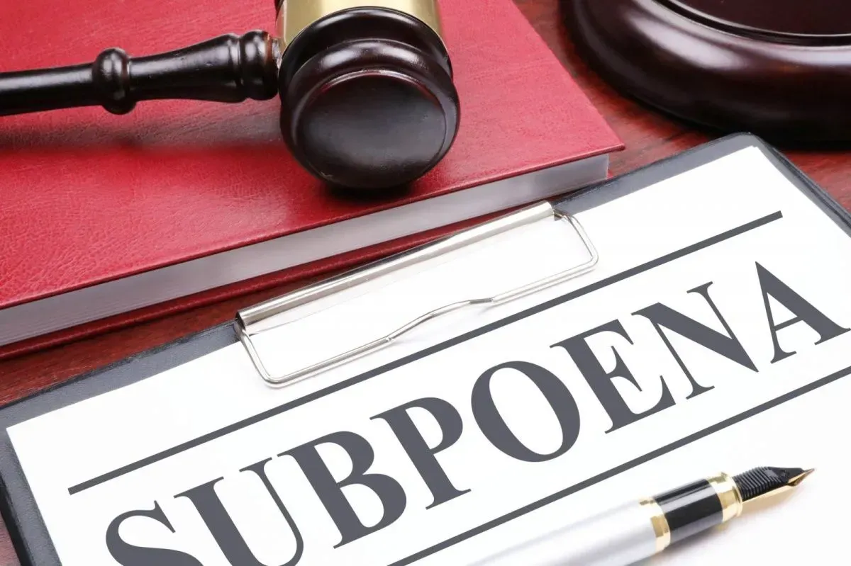Gavel, book, and 
