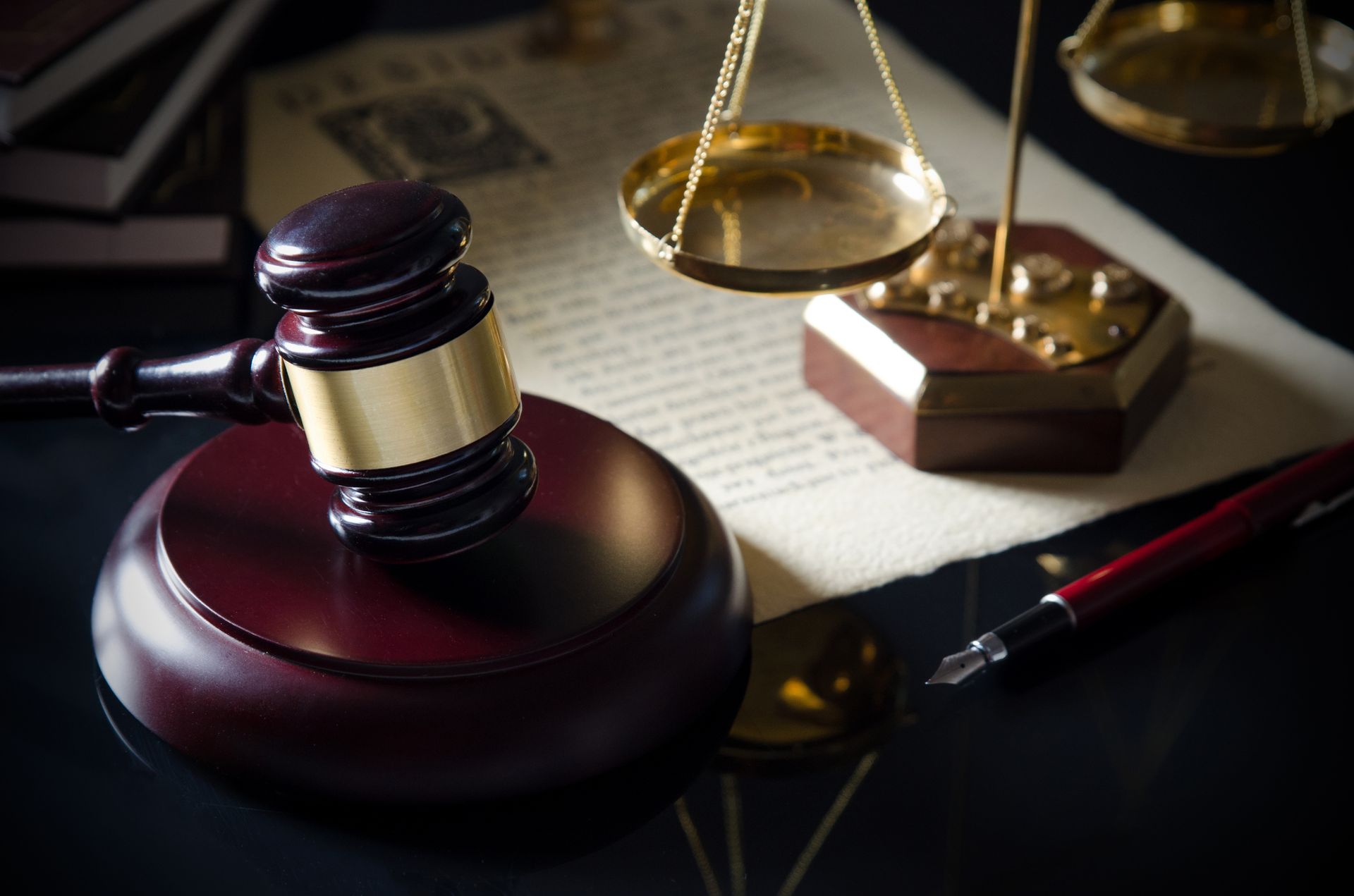 Gavel and scales of justice showcasing a criminal lawyer representing legal authority and fairness. 