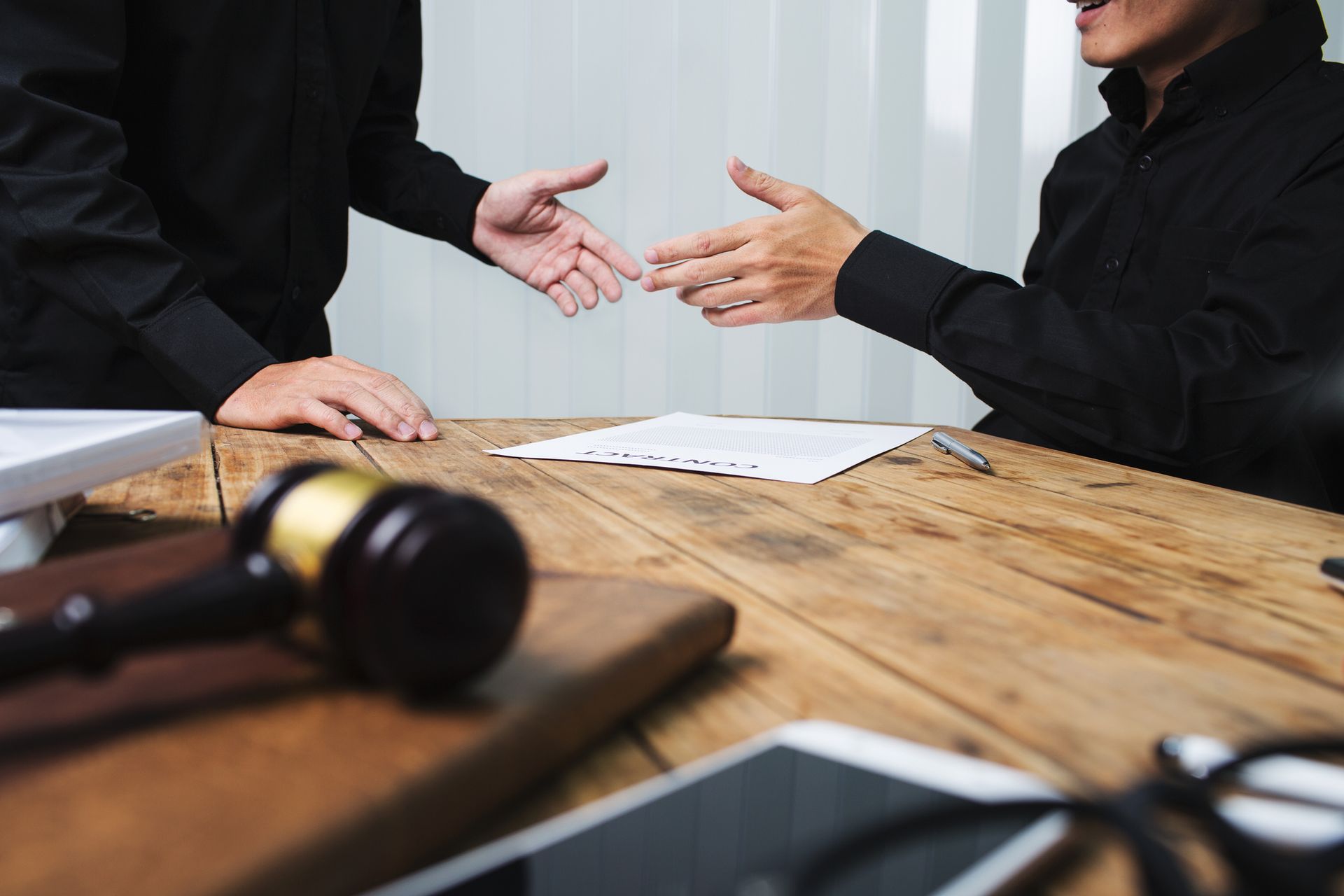 Lawyer consulting a client showcasing a criminal lawyer representing personalized legal advice. 