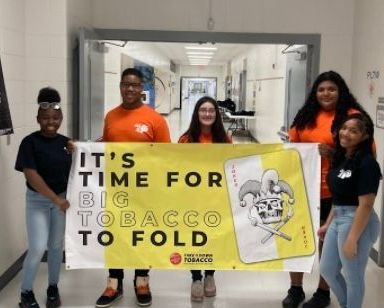ADAPT Students holding a 