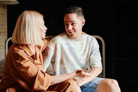 a mother and son talking