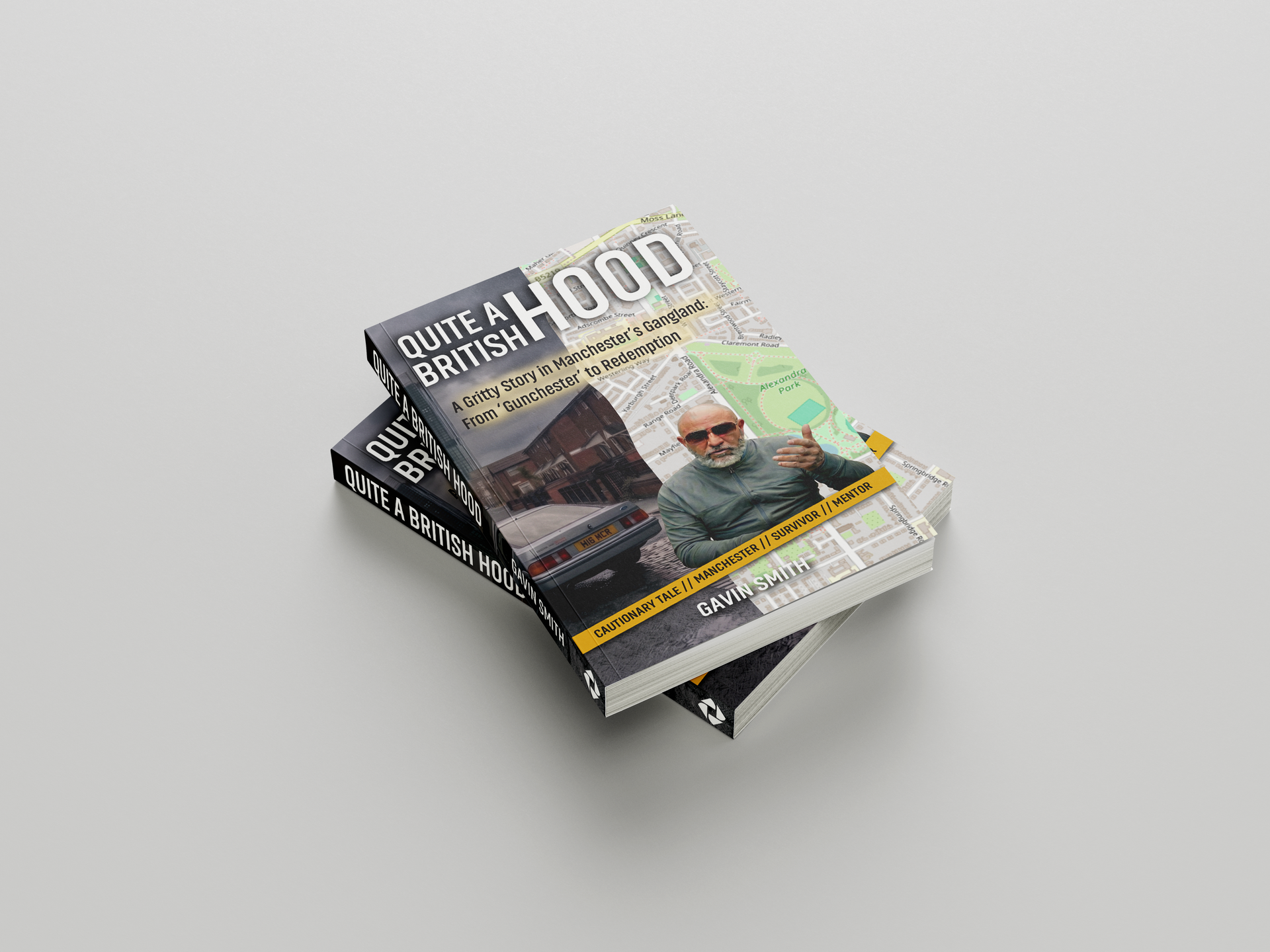 Stack of glossy magazines on a light gray background, top one showing a man in sunglasses.