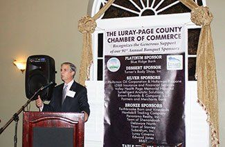 Obenshein speaking at Chamber event