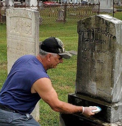Syntelligent employee scrubbing tombstone