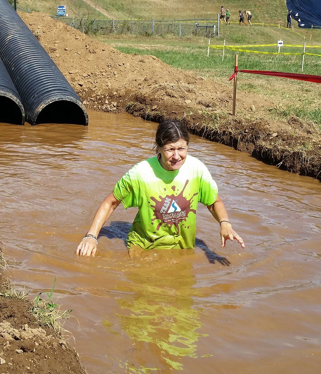 Syntelligent employee Maggie Marangione at Mud Race