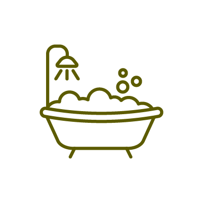 Un dessin au trait d'une baignoire remplie de mousse et de bulles.