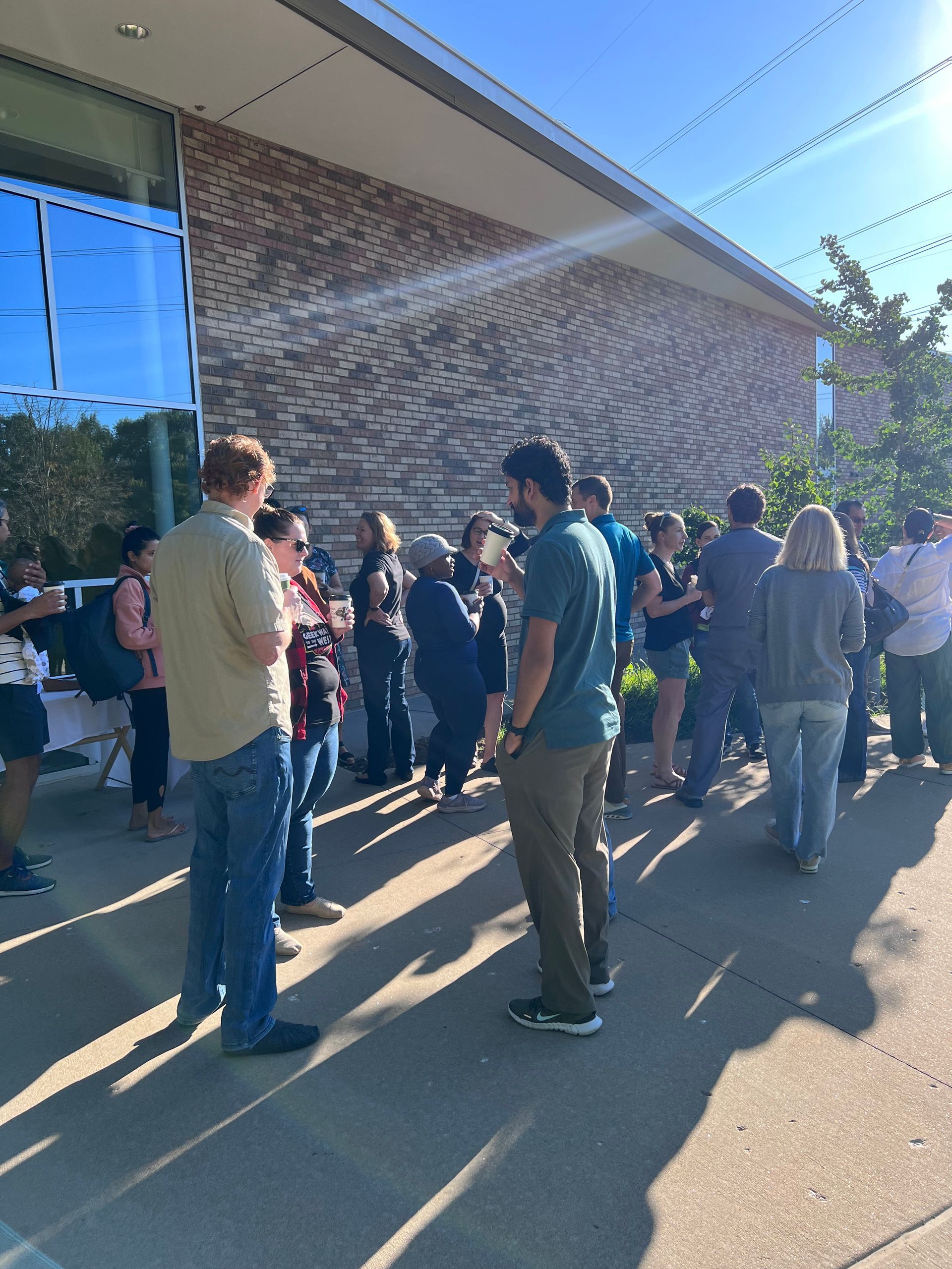 Parents gather for a CMS Coffee Social event. 