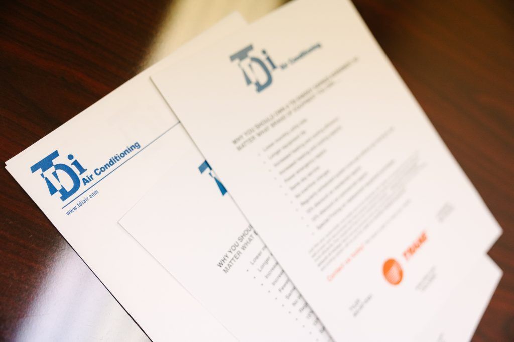 Two documents with the logo