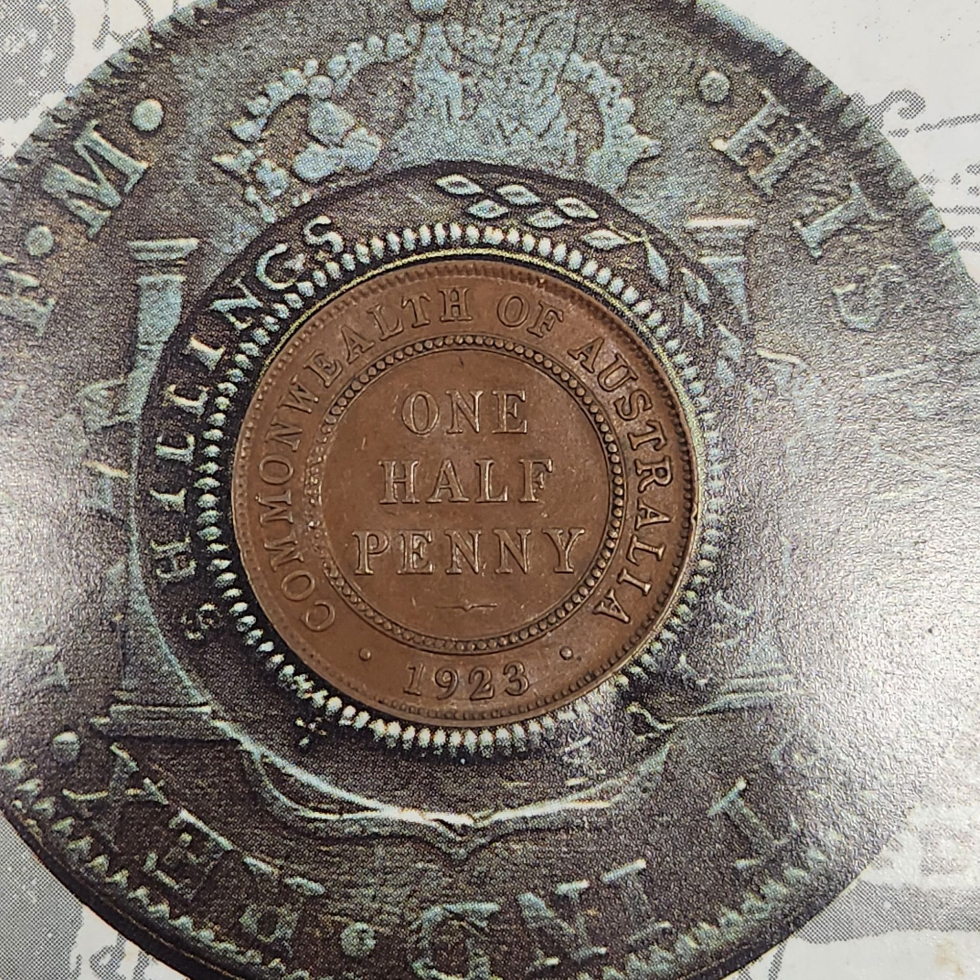 Close-up of the rare 1923 Australian Half Penny, a highly sought-after pre-decimal coin by collectors.