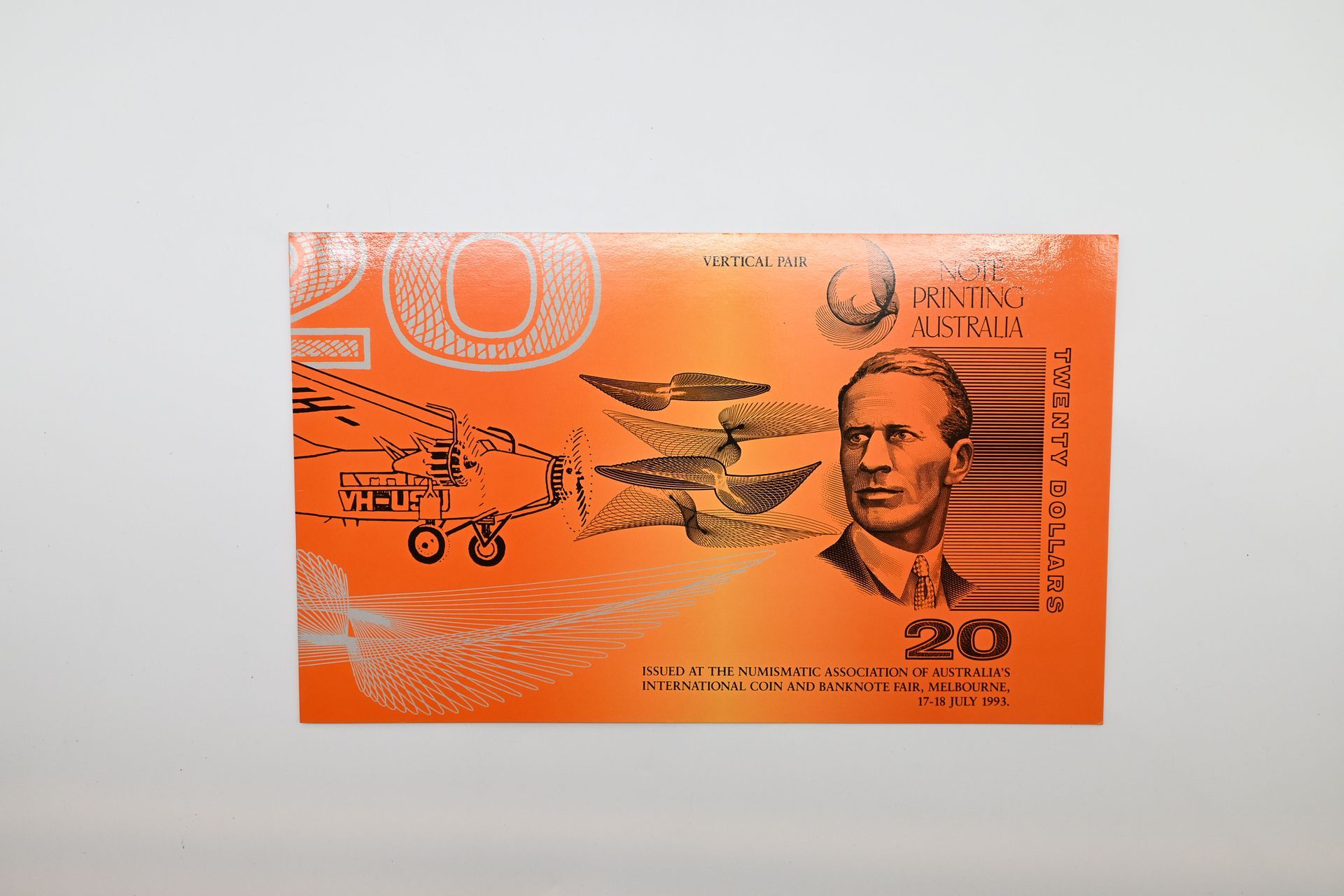 1993 Fraser/Cole $20 uncut vertical pair with gold serial numbers in its Note Printing Australia folder, Lot 1082 at Copeland Roberts Auction 021