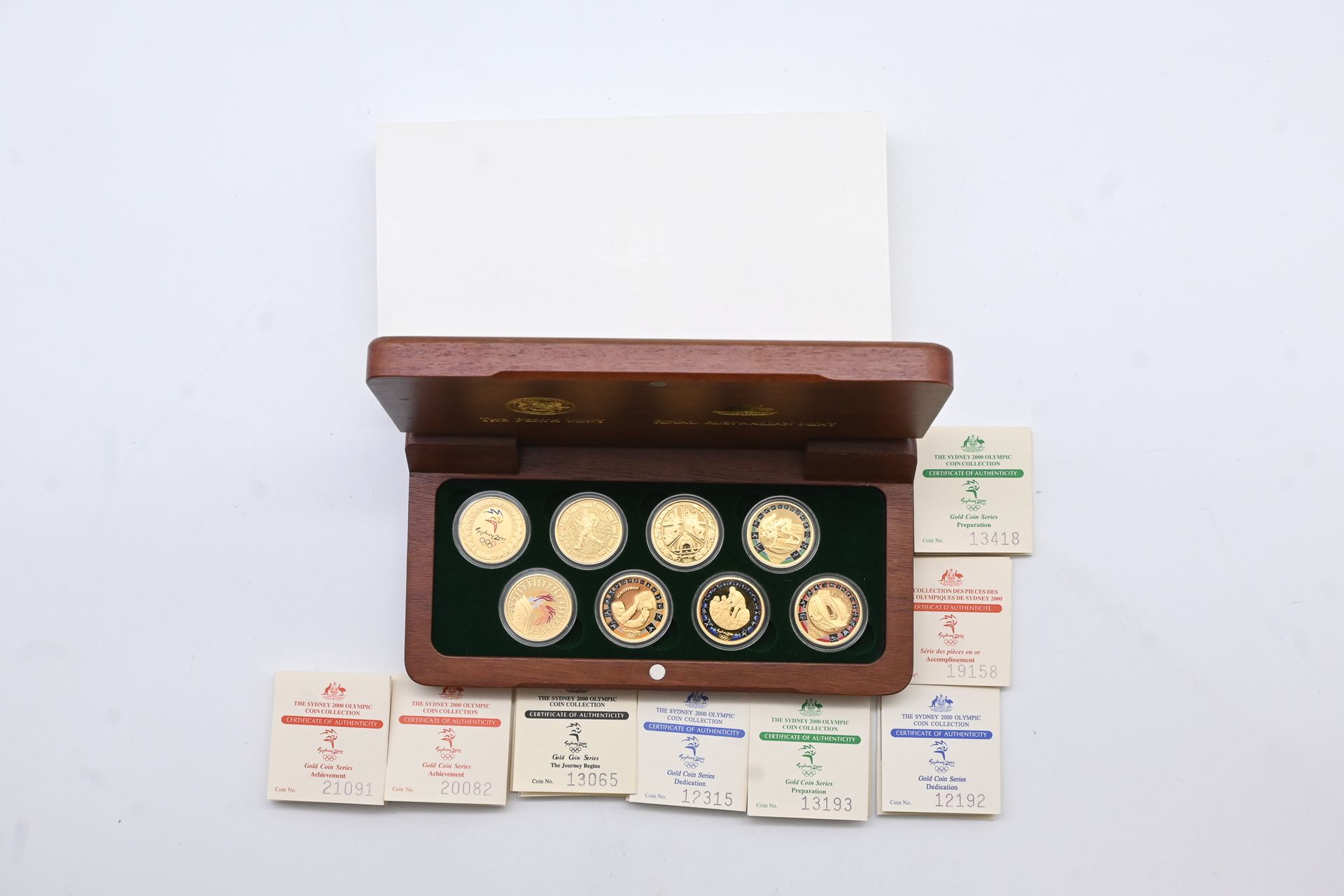 Complete 2000 Sydney Olympics gold proof coin collection in presentation case, Lot 119 at Copeland Roberts Auction 020